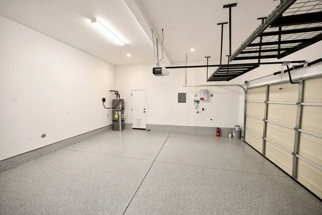 Epoxy-finished garage with overhead storage