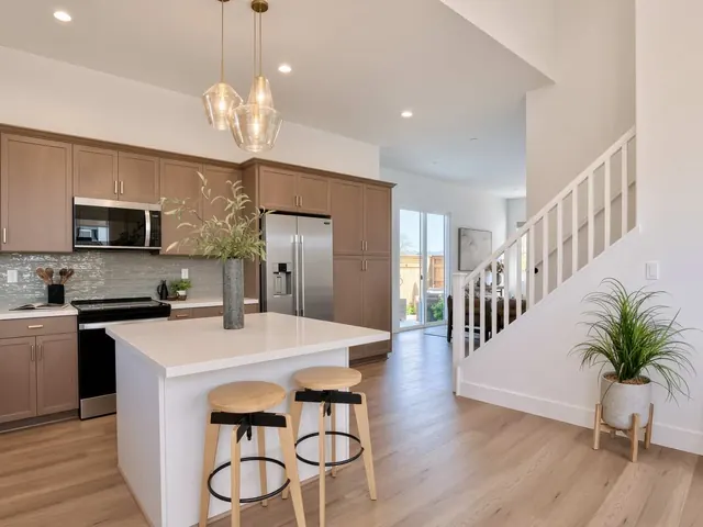 Kitchen & stairs, from the entry